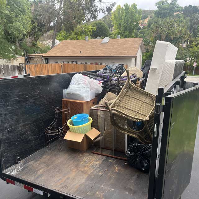 a truck full of furniture and household items