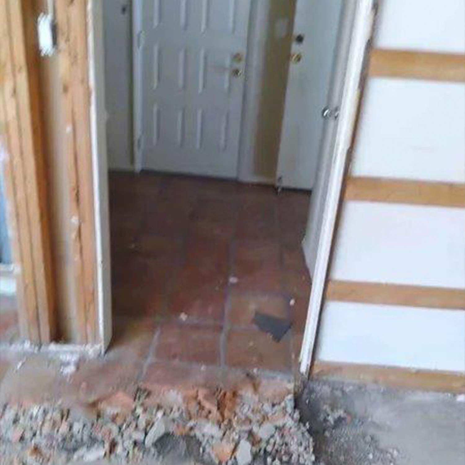 a door and a pile of rubble