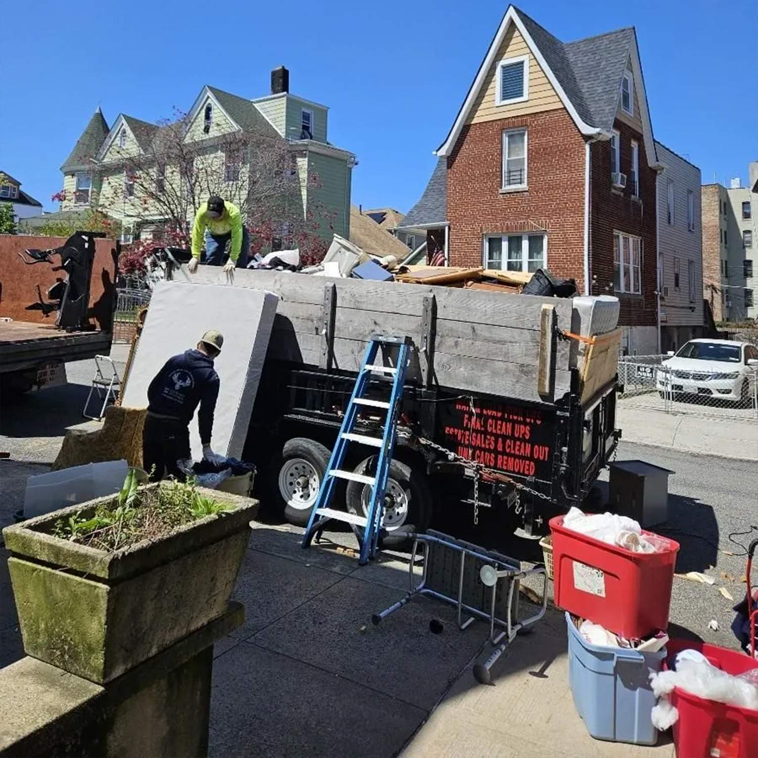 a group of people working on a truck