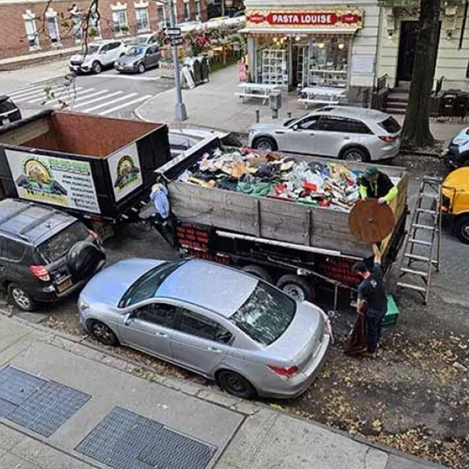 a group of cars parked on the side of a street